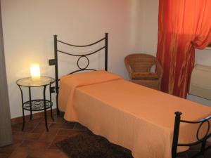 A bed or beds in a room at B & B OASI