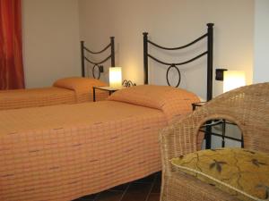 A bed or beds in a room at B & B OASI