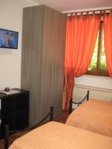 A bed or beds in a room at B & B OASI