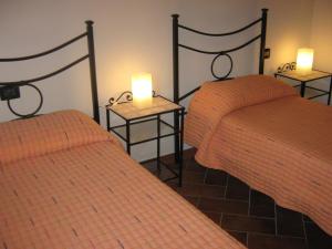 A bed or beds in a room at B & B OASI
