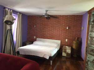 Le Suites al Lago客房内的一张或多张床位
