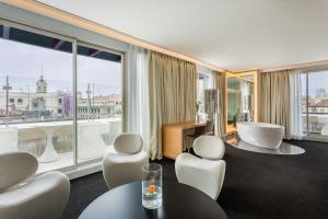 a hotel room with a view of the city at Room Mate Oscar, Madrid in Madrid