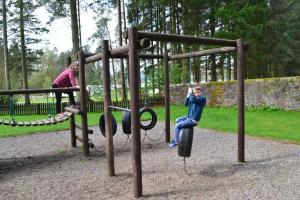 Children's play area at Callander Woods Holiday Park