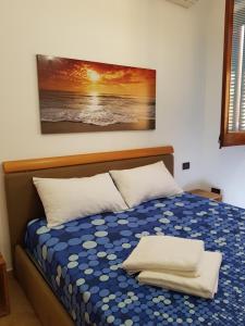 Posteľ alebo postele v izbe v ubytovaní Appartamento Mazzini 8