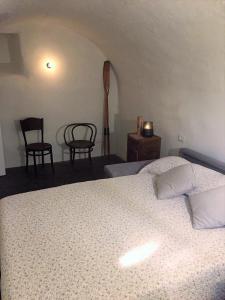 Voodi või voodid majutusasutuse Al vecchio porto casa a Cannero toas