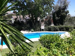 Bazén v ubytovaní Mi Jardin alebo v jeho blízkosti