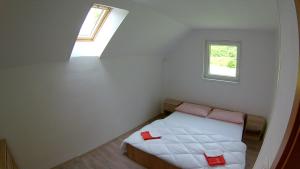 Postel nebo postele na pokoji v ubytování Apartma Jernej
