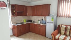 Kuchyňa alebo kuchynka v ubytovaní Gina apartman Siófok