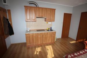 Kuchnia lub aneks kuchenny w obiekcie Apartamenty Klemens