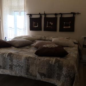 En eller flere senger på et rom på Casetta di San Martino
