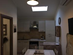 Kjøkken eller kjøkkenkrok på Casetta di San Martino