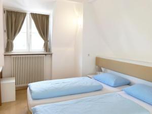 Postel nebo postele na pokoji v ubytování Manzoni Rooms
