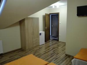 TV a/nebo společenská místnost v ubytování Rita Apartman