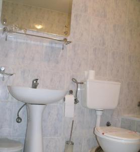 Baðherbergi á Garni Hotel PBG