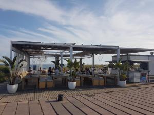 Reštaurácia alebo iné gastronomické zariadenie v ubytovaní Gava Ocean View