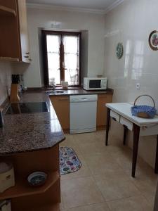 Kuchyň nebo kuchyňský kout v ubytování La casa de los abuelos