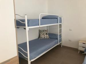a couple of bunk beds in a room at Veneto 29 in Alghero