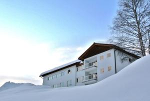 Chalet Schneekristall om vinteren