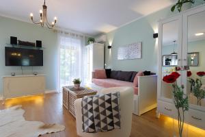 Televízia a/alebo spoločenská miestnosť v ubytovaní Studio Apartment Ada 2