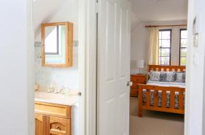 Vonios kambarys apgyvendinimo įstaigoje Emma's Cottage Vineyard