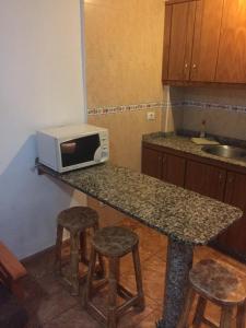 A kitchen or kitchenette at Apartment Yumbo Centrum Még 3 kép