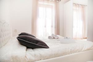 Postel nebo postele na pokoji v ubytování Casa Marzia Affittacamere