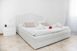 Postel nebo postele na pokoji v ubytování Casa Marzia Affittacamere