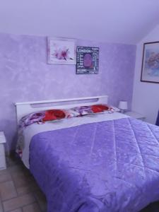 A bed or beds in a room at B&B Angels