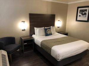 Postel nebo postele na pokoji v ubytování El Castell Motel