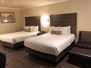 Postel nebo postele na pokoji v ubytování El Castell Motel