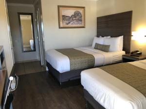 Postel nebo postele na pokoji v ubytování El Castell Motel