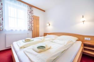 Postel nebo postele na pokoji v ubytování Feriengut Fingerhof