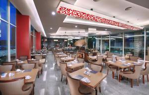 A restaurant or other place to eat at ASTON Lampung City Hotel