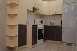 مطبخ أو مطبخ صغير في апартаменты на Гоголя 63