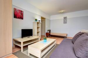 O zonă de relaxare la Agape Apartments