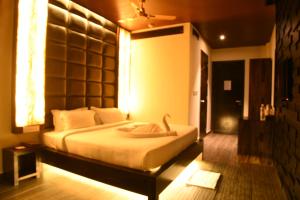 Cama ou camas em um quarto em Haywizz Havelock Island Resort
