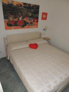 Postel nebo postele na pokoji v ubytování Casa sulla spiaggia