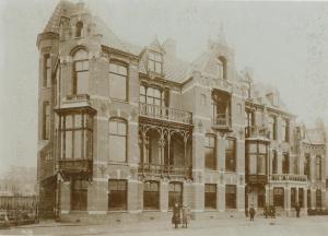 an old photo of a building with people standing outside at Best Western Hotel Den Haag in The Hague