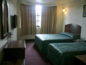 Postel nebo postele na pokoji v ubytování Hotel Remix