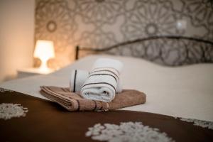 Posteľ alebo postele v izbe v ubytovaní Apartmani Godinić