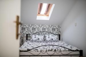 Posteľ alebo postele v izbe v ubytovaní Apartmani Godinić