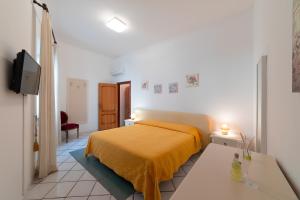 TV a/nebo společenská místnost v ubytování Mimì B&B