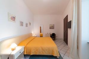 Postel nebo postele na pokoji v ubytování Mimì B&B