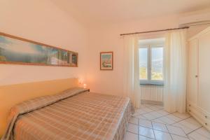 Postel nebo postele na pokoji v ubytování Mimì B&B