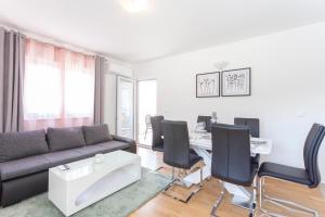 Posezení v ubytování Apartments Dora