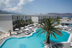 an overhead view of the pool at the resort at Mythos Palace Resort & Spa in Georgioupolis