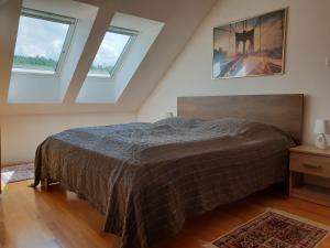 Ένα ή περισσότερα κρεβάτια σε δωμάτιο στο Apartment Beks