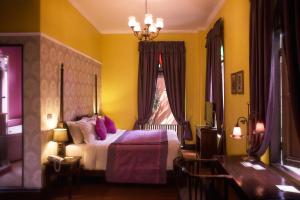 Ein Bett oder Betten in einem Zimmer der Unterkunft Praya Palazzo - SHA Plus