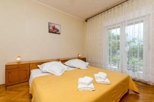Postel nebo postele na pokoji v ubytování Apartment Antonija
