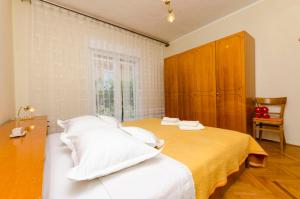 Postel nebo postele na pokoji v ubytování Apartment Antonija